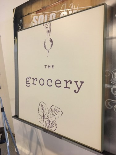 The grocery painted sign