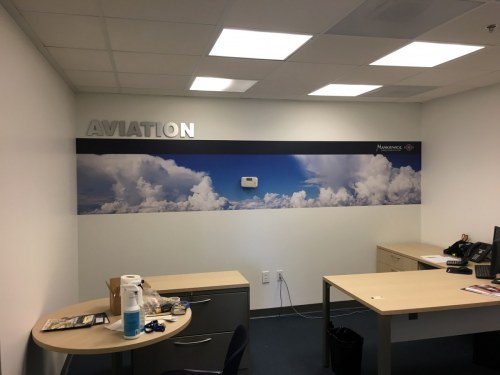 Wall mural with dimensional lettering