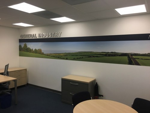 Printed wall mural with dimensional lettering