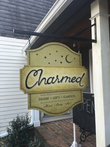 Charmed right angle entrance sign